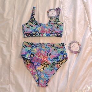 NWT Infamous swim 2 piece size medium. Electric leopard. $50 each piece.